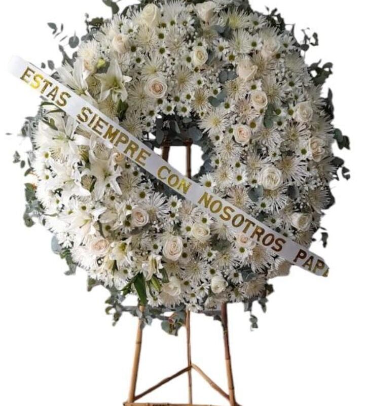 Corona Fúnebre redonda - rosas, lirios y margaritas a domicilio en Cali