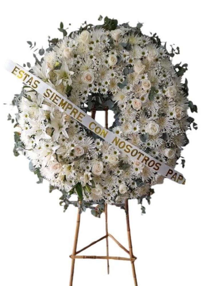 Corona Fúnebre redonda - rosas, lirios y margaritas a domicilio en Cali